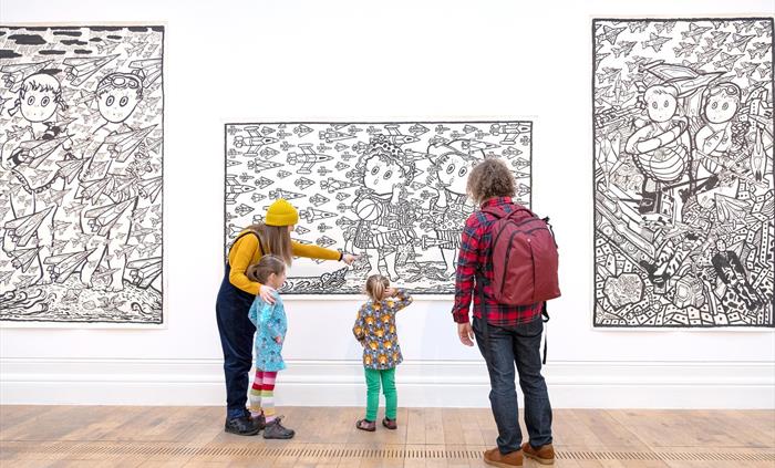 Image of family in gallery